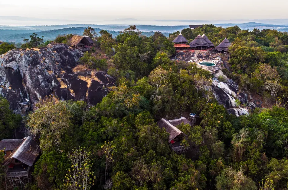 The rocky, wooded landscape of Lake Mburo National Park from the air