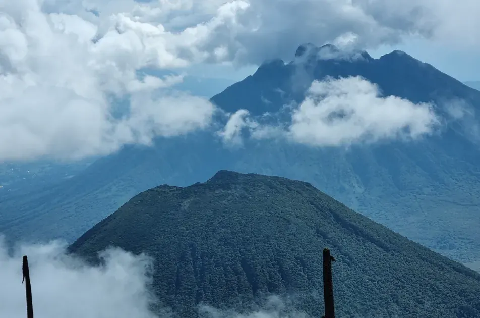 The Virunga volcanoes rising behind Mgahinga Gorilla National Park