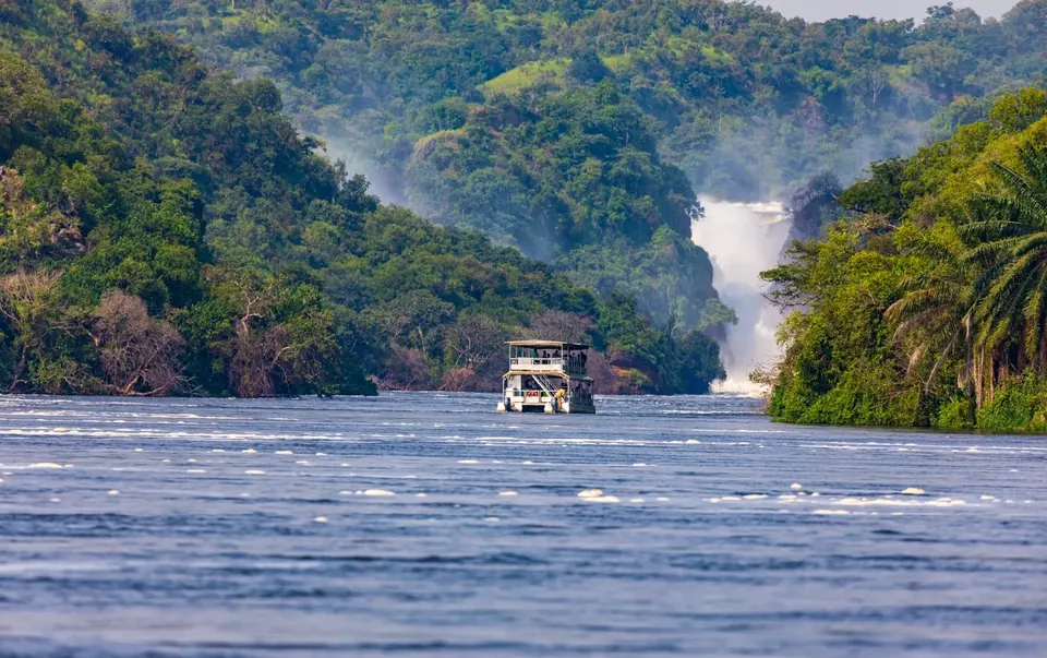 A boat on the Victoria Nile approaching the base of Murchison Falls